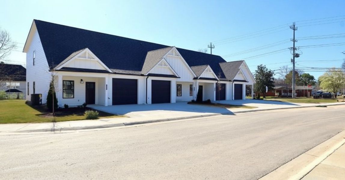 Front exterior of a new home in The Nassau, Chattanooga, TN, highlighting curb appeal (Image 18). Front exterior of a new home in The Nassau, Chattanooga, TN, highlighting curb appeal (Image 18).