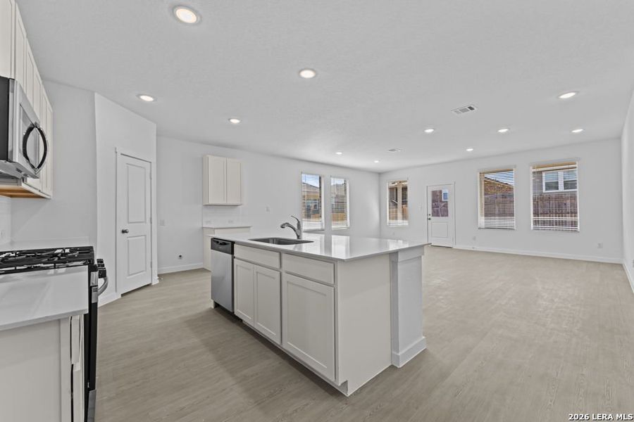 Furnished interior view inside a new home in Espada, San Antonio (Image 7).