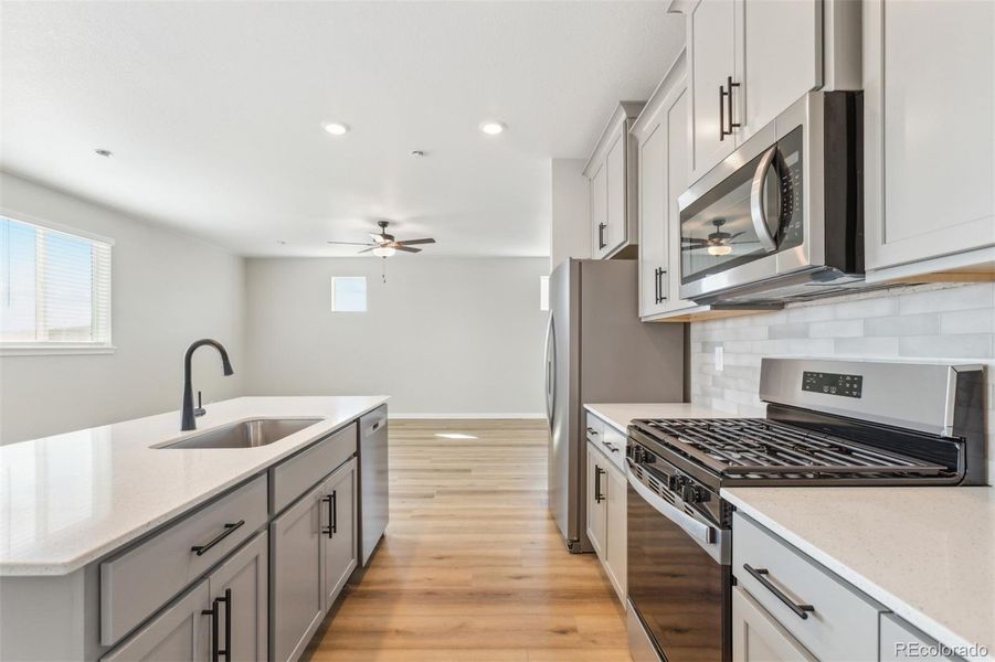 Furnished interior view inside a new home in , Commerce City (Image 2).