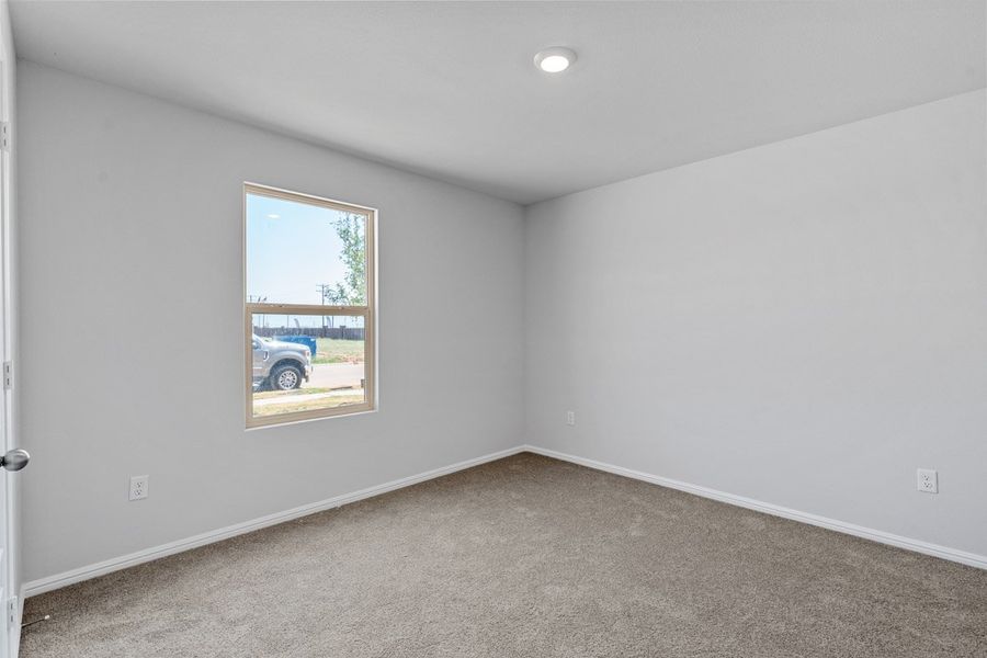 Representative unfurnished interior of a home built from the KINGSTON by D.R. Horton in Faculty Row, Abilene (Image 24).