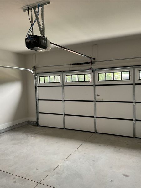 Insulated door and garage door opener