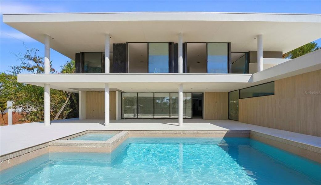 Exterior details and patio area of a home in , Sarasota (Image 6).