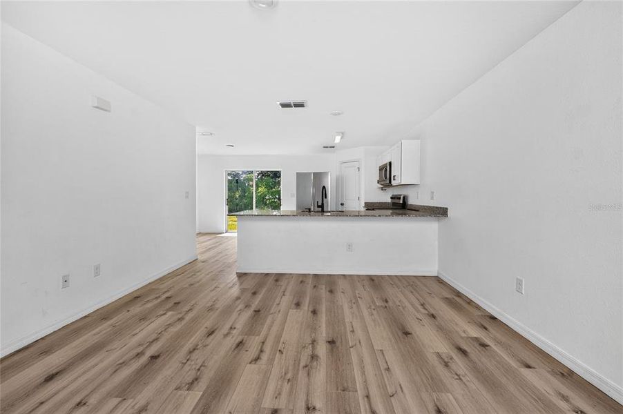 Spacious, unfurnished interior of a new home in , Port Charlotte (Image 24).