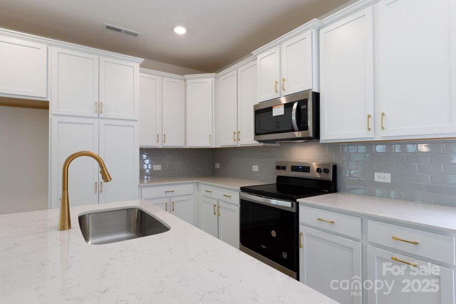 Furnished interior view inside a new home in , Charlotte (Image 9).