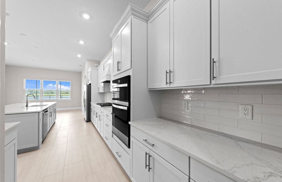 Furnished interior view inside a new home in Del Webb Oak Creek, North Fort Myers (Image 10).