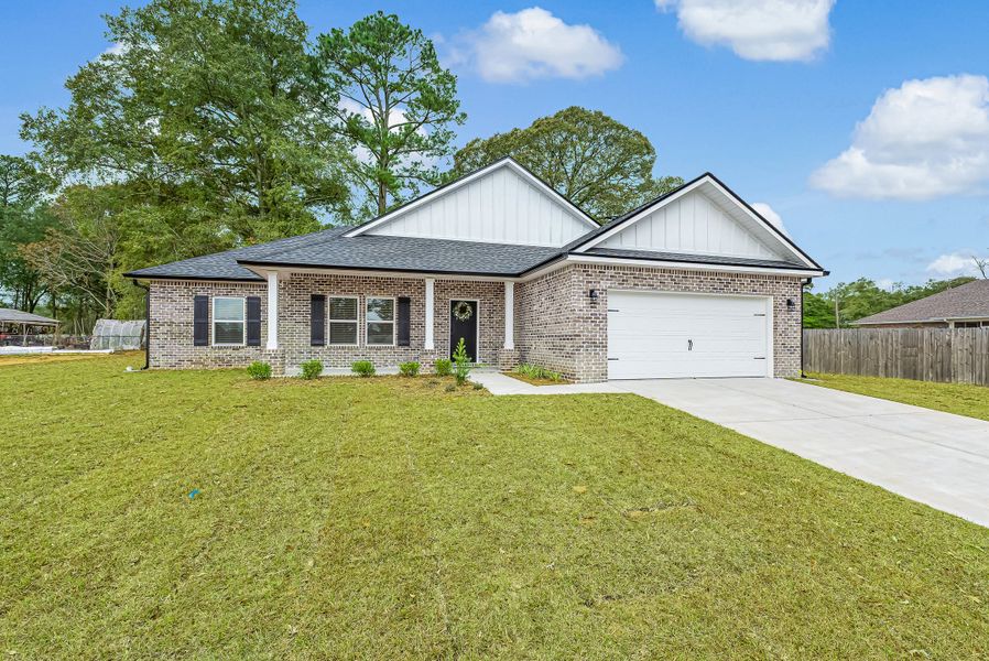 Front exterior of a new home in Barton's Bend, Crestview, FL, highlighting curb appeal (Image 29). Front exterior of a new home in Barton's Bend, Crestview, FL, highlighting curb appeal (Image 29).