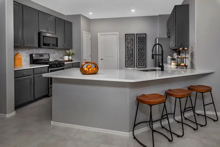 Representative furnished interior of a home built from the 2212 by KB Home in Mirador Ridge Blossom, Tucson (Image 4). Representative furnished interior of a home built from the 2212 by KB Home in Mirador Ridge Blossom, Tucson (Image 4).