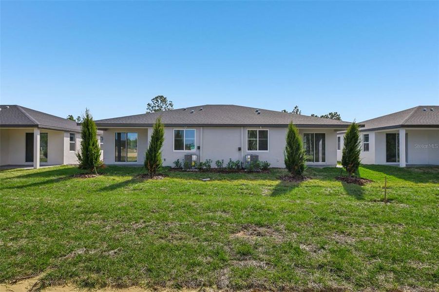 Exterior details and patio area of a home in Ridgehaven - Villas, Ormond Beach (Image 23).