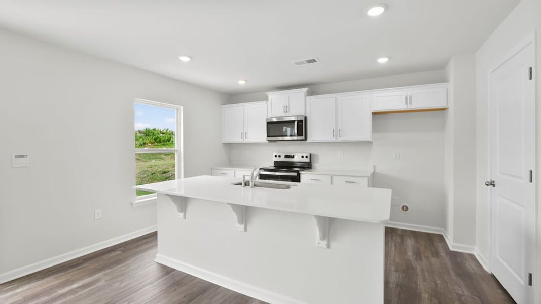 Furnished interior view inside a new home in Treemont Commons, Wellford (Image 13).