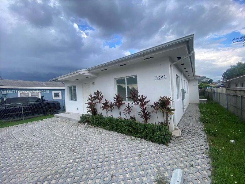Exterior details and patio area of a home in , Miami (Image 12). Exterior details and patio area of a home in , Miami (Image 12).