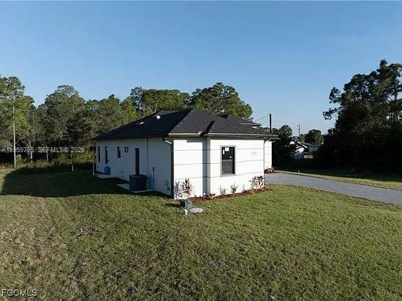 Exterior details and patio area of a home in , Lehigh Acres (Image 21).