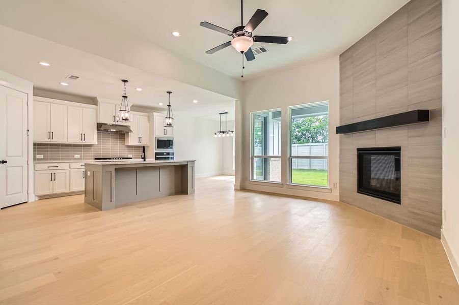 Plan 1560 Representative Photo - Living Room/Kitchen/Dining Plan 1560 Representative Photo - Living Room/Kitchen/Dining