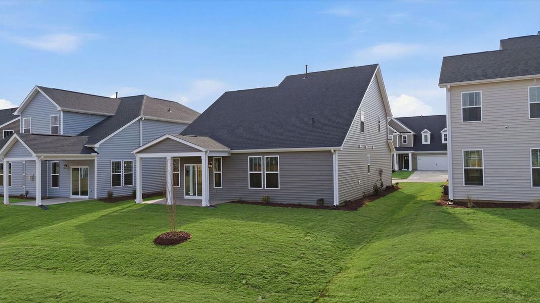 Exterior details and patio area of a home in Walnut Ridge, Inman (Image 23).