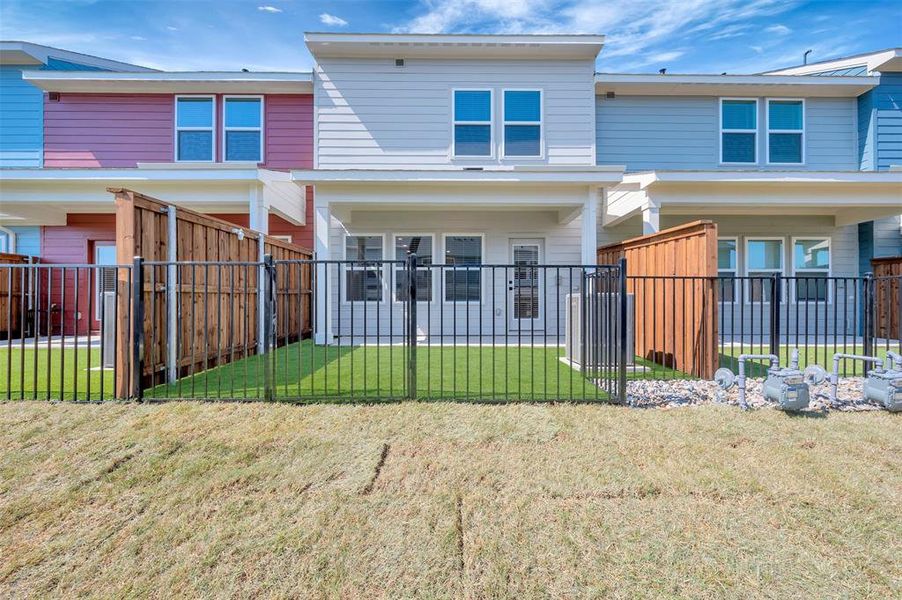 Exterior details and patio area of a home in Providence Commons, Providence Village (Image 19).