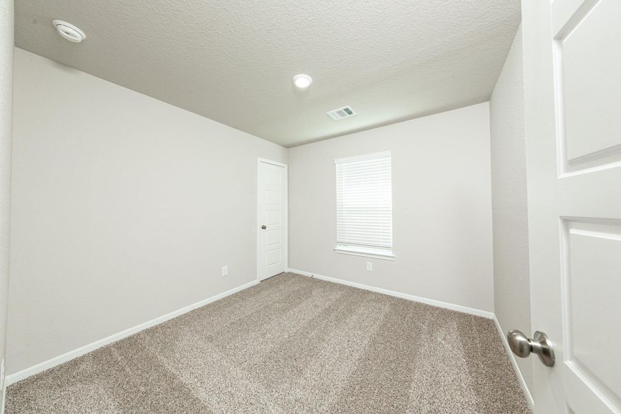 Spacious, unfurnished interior of a new home in Mackenzie Creek, Conroe (Image 25). Spacious, unfurnished interior of a new home in Mackenzie Creek, Conroe (Image 25).