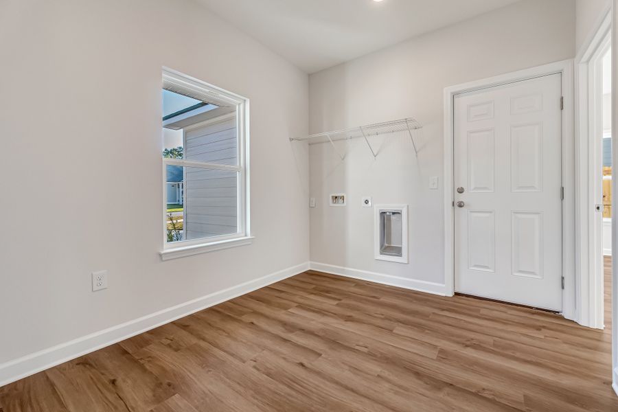 Spacious, unfurnished interior of a new home in Live Oak Cottages, Freeport (Image 18). Spacious, unfurnished interior of a new home in Live Oak Cottages, Freeport (Image 18).