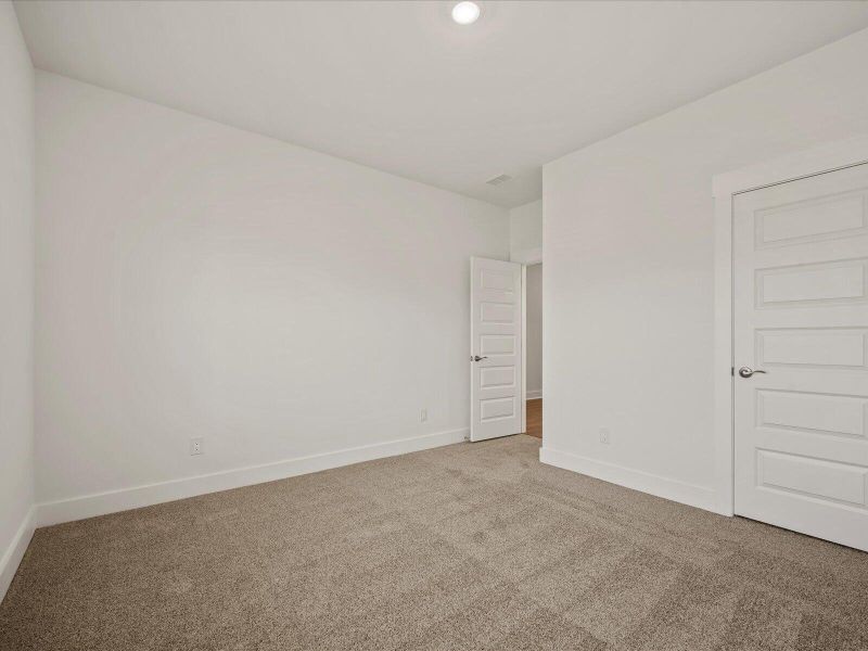 Spacious, unfurnished interior of a new home in The Coves at Lakes of Cane Bay, Summerville (Image 22). Spacious, unfurnished interior of a new home in The Coves at Lakes of Cane Bay, Summerville (Image 22).
