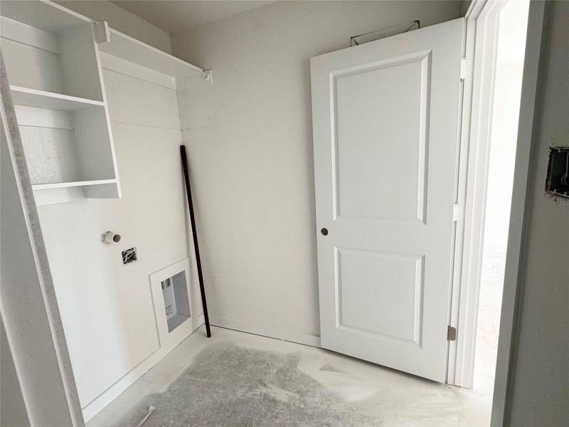 Washroom featuring concrete flooring Washroom featuring concrete flooring
