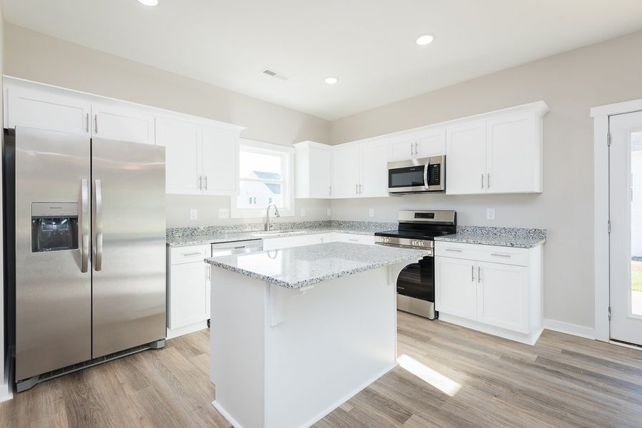 Furnished interior view inside a new home in Pallini Place, Elon (Image 4).