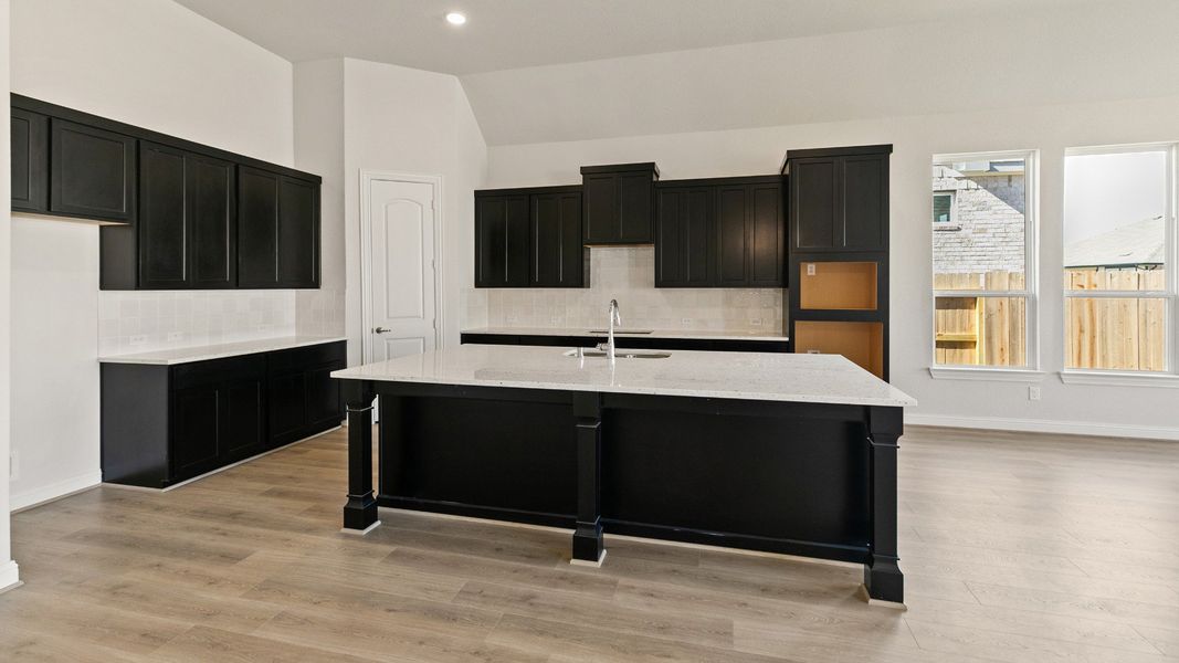 Representative furnished interior of a home built from the Yale by DRB Homes in Creekhaven, Iowa Colony (Image 7).
