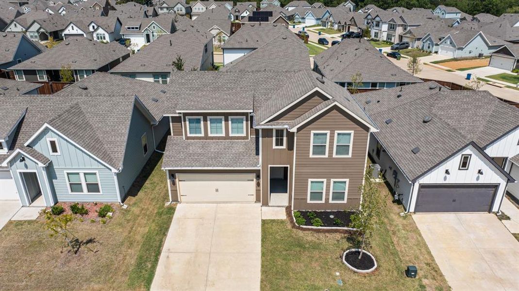 Front exterior of a new home in , Providence Village, TX, highlighting curb appeal (Image 1).