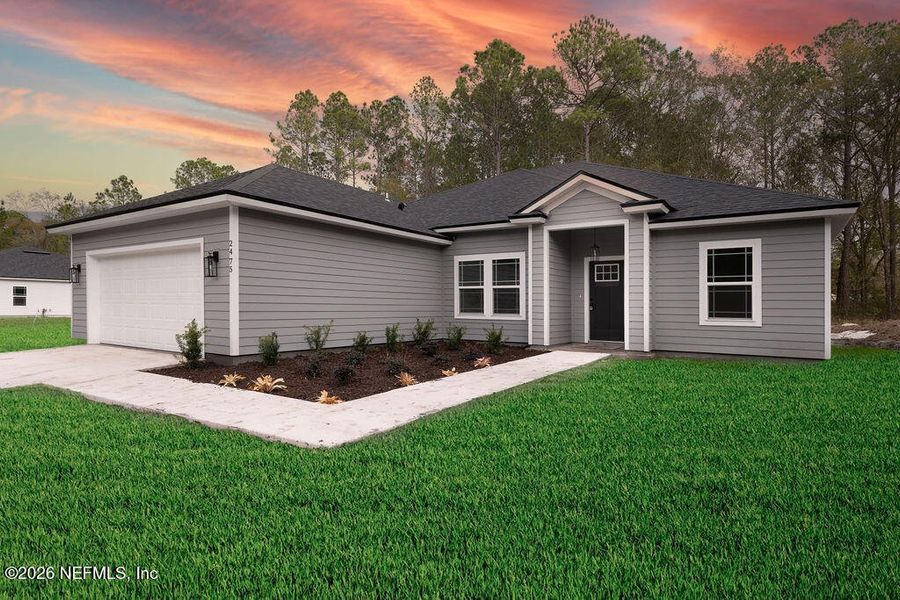 Front exterior of a new home in , Middleburg, FL, highlighting curb appeal (Image 2). Front exterior of a new home in , Middleburg, FL, highlighting curb appeal (Image 2).