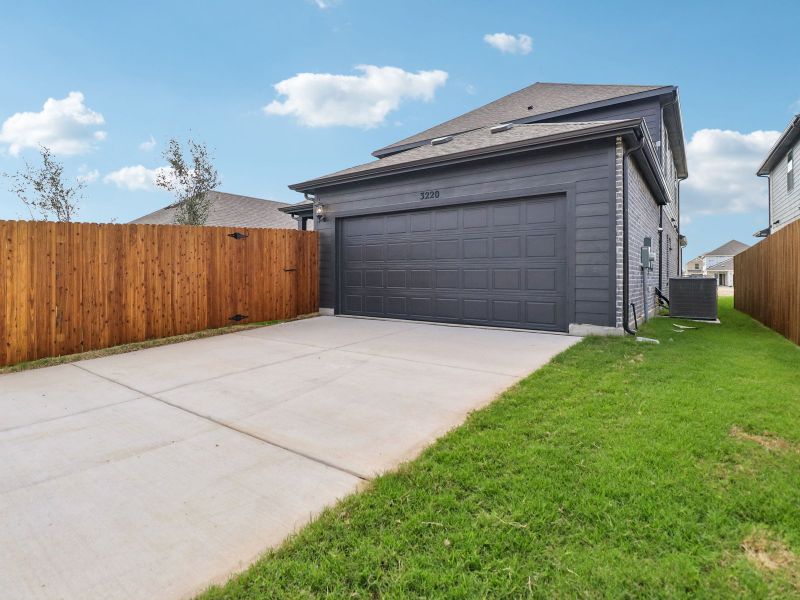 Exterior details and patio area of a home in Cibolo Hills West - Spring Series, Fort Worth (Image 3).
