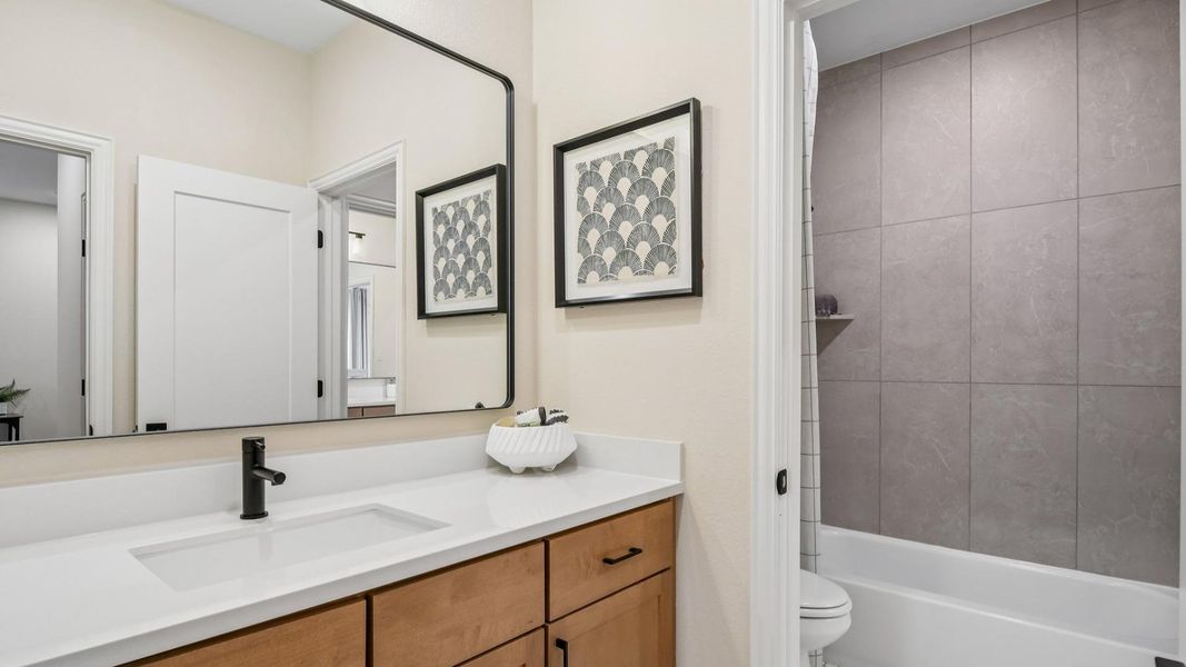 Model home photos of similar floorplans, not pictures of actual home.