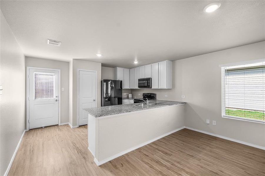 Furnished interior view inside a new home in , Fort Worth (Image 6).