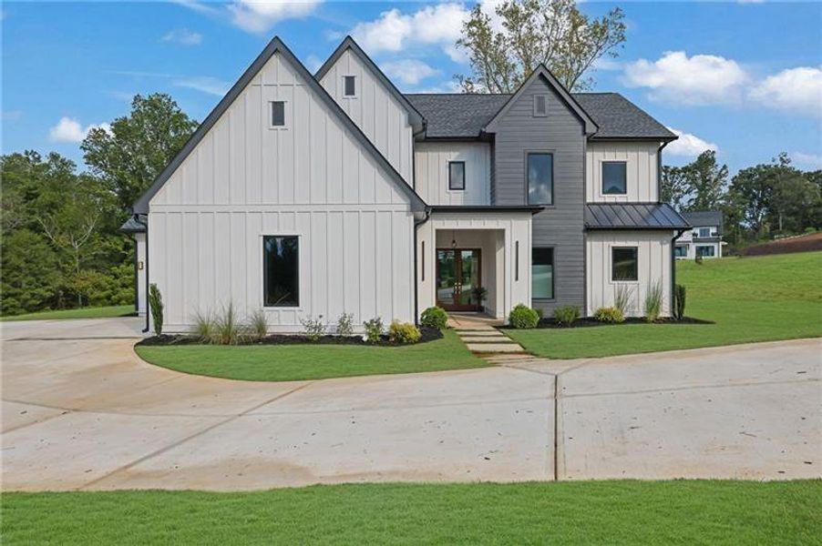 Front exterior of a new home in , Canton, GA, highlighting curb appeal (Image 34).