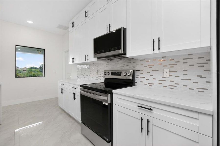 Furnished interior view inside a new home in , Port Charlotte (Image 38).