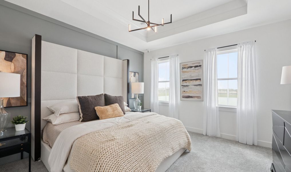 Primary suite with tray ceiling Primary suite with tray ceiling