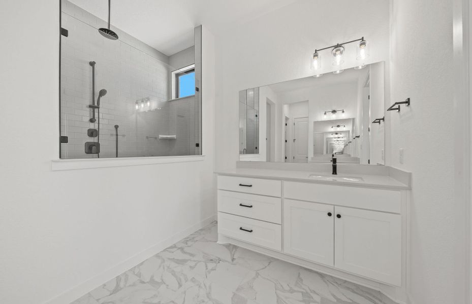 Furnished interior view inside a new home in 6 Creeks, Kyle (Image 11).