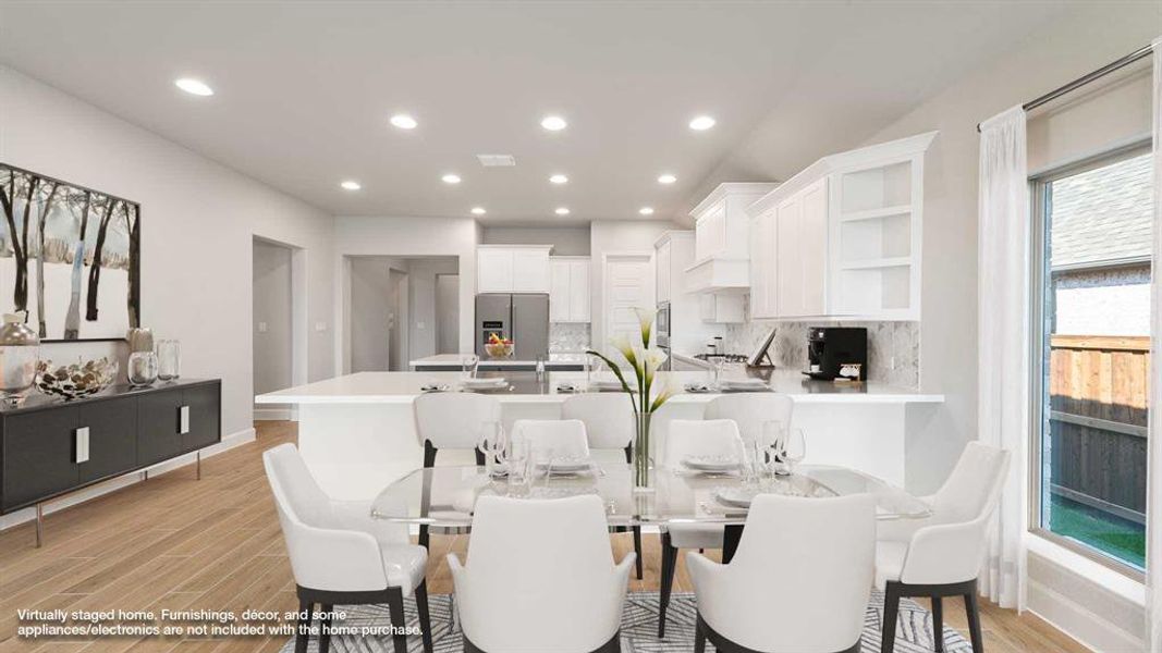 Dining area featuring light hardwood / wood-style flooring