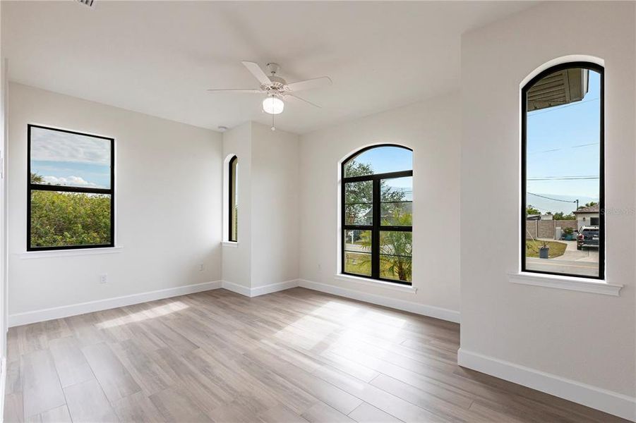 Spacious, unfurnished interior of a new home in , Port Charlotte (Image 53).