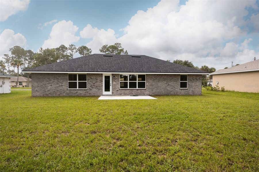 Exterior details and patio area of a home in Palm Coast, Palm Coast (Image 2). Exterior details and patio area of a home in Palm Coast, Palm Coast (Image 2).