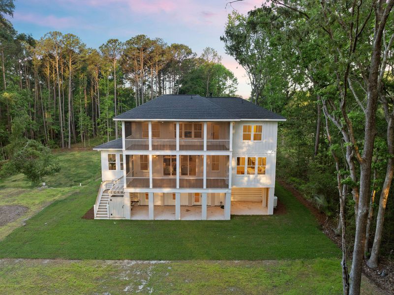 Exterior details and patio area of a home in , Awendaw (Image 35).