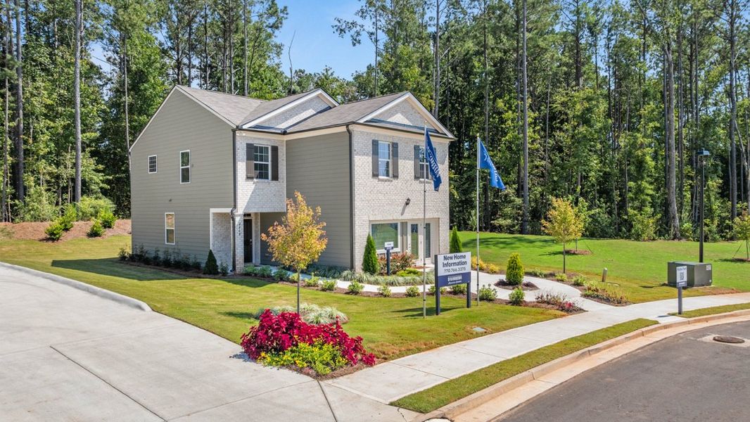 Representative exterior photo of a completed home built from the AISLE by D.R. Horton in Pointe Park, Union City, GA (Image 2).