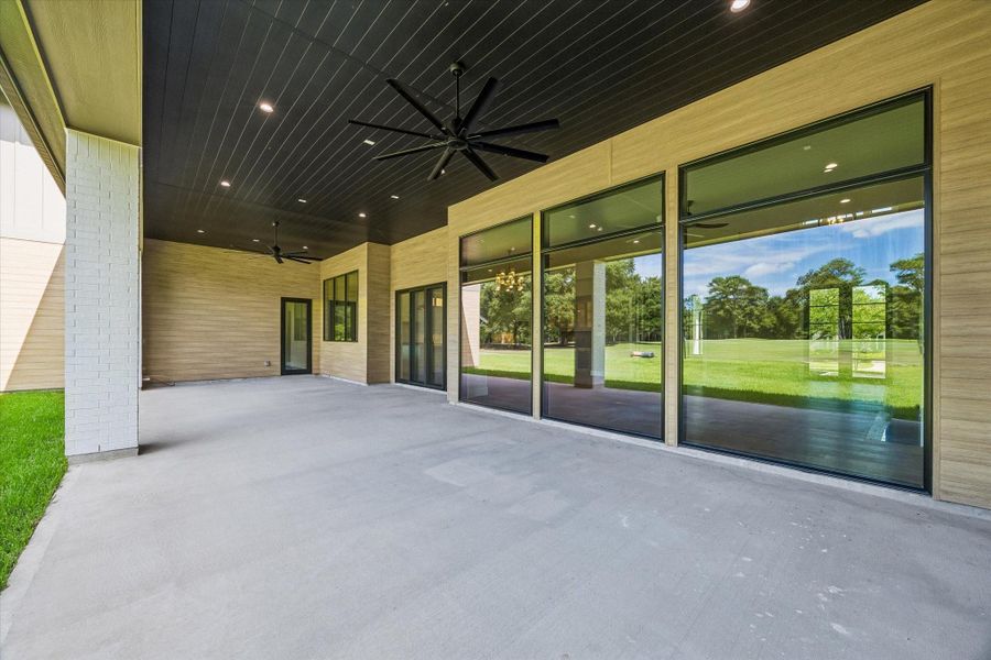Exterior details and patio area of a home in , Houston (Image 26).