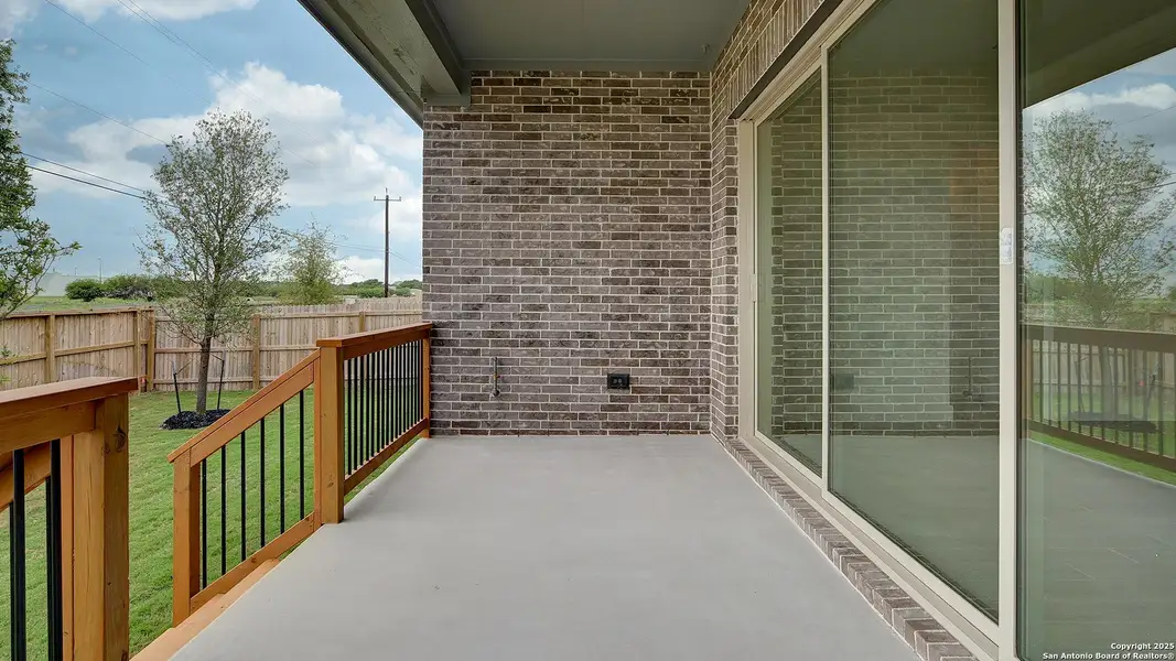 Exterior details and patio area of a home in Alsatian Oaks 50', Castroville (Image 4).