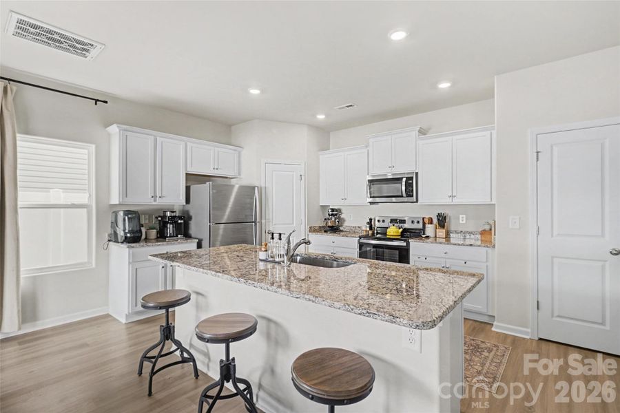 Furnished interior view inside a new home in McKee Creek Village, Charlotte (Image 9).