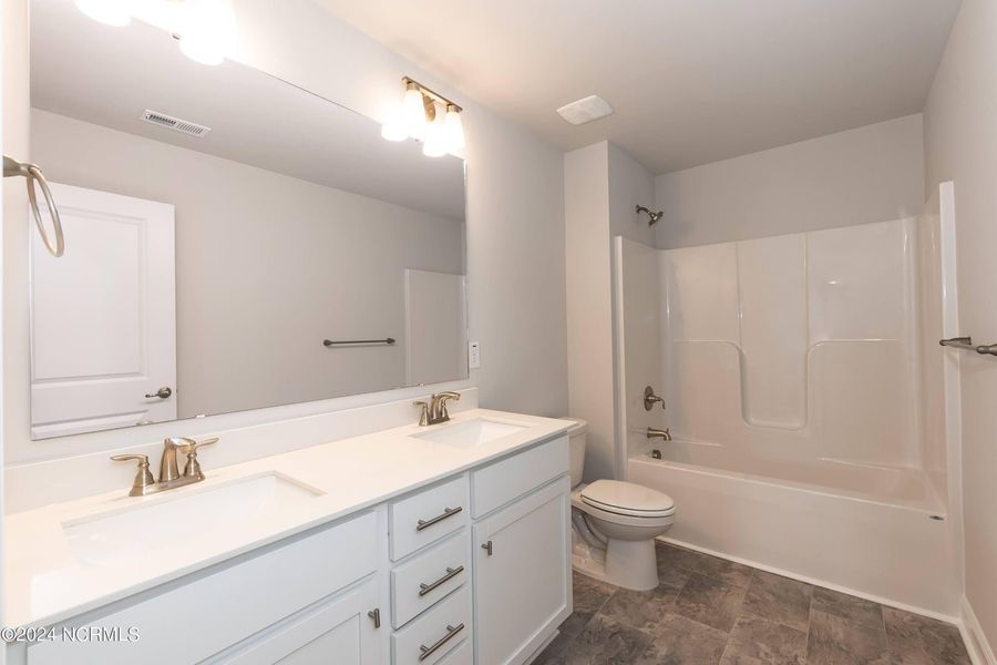 Furnished interior view inside a new home in Waverly Place, Richlands (Image 10).