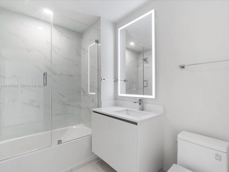 Furnished interior view inside a new home in Aria Reserve, Miami (Image 10).
