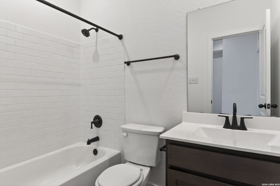 Furnished interior view inside a new home in Nopal Valley, San Antonio (Image 8).