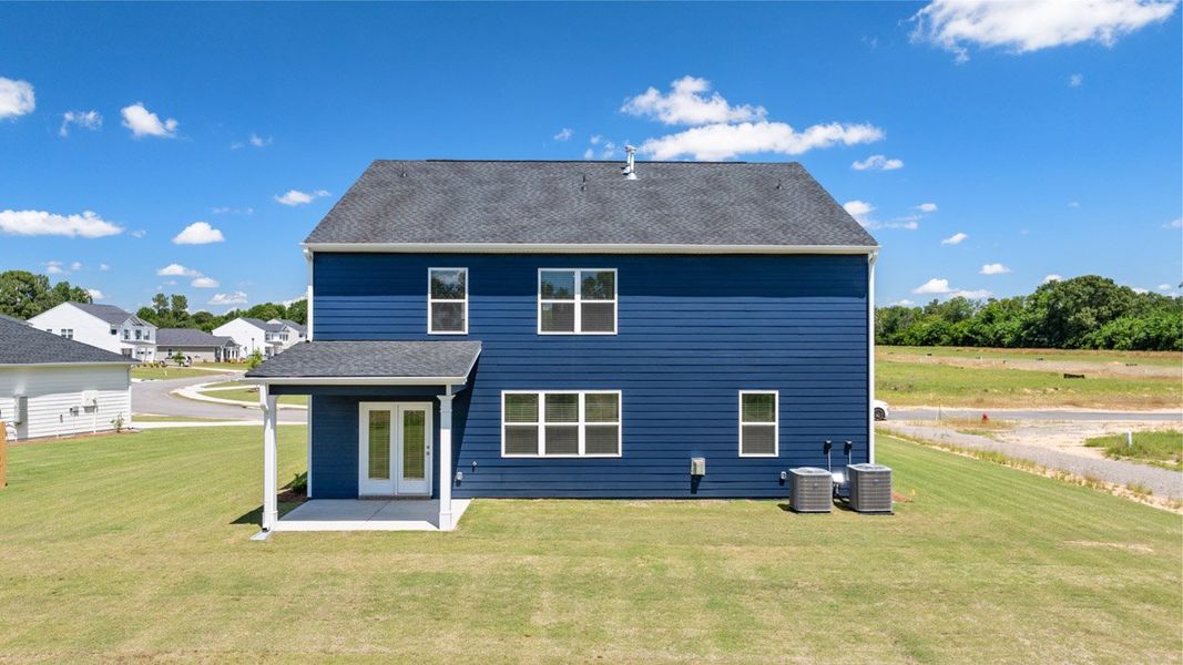 Front exterior of a new home in Southwind Village, Evans, GA, highlighting curb appeal (Image 25).