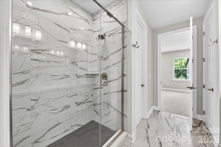 Primary tiled walk-in shower Primary tiled walk-in shower