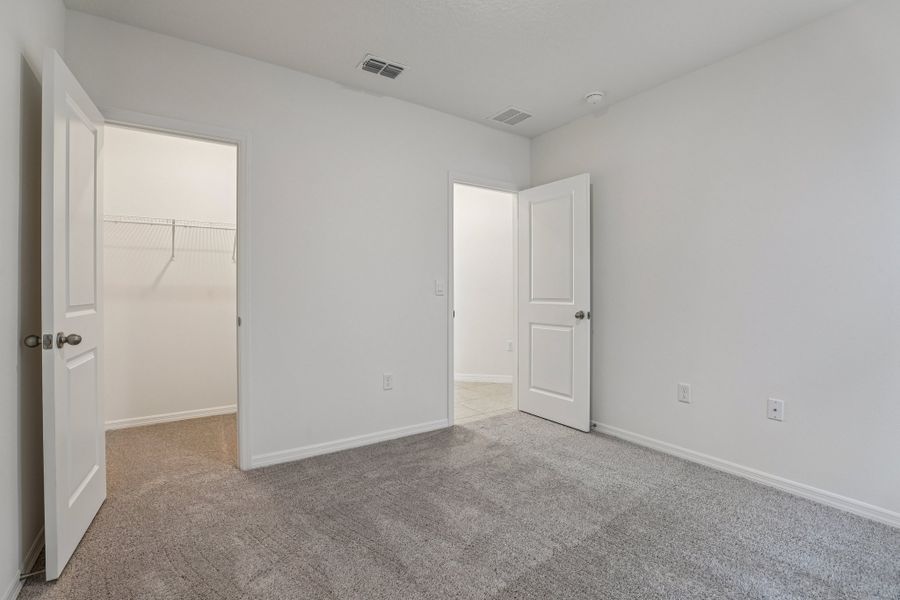 Representative unfurnished interior of a home built from the Vista by Maronda Homes in Heritage Station, Punta Gorda (Image 28).