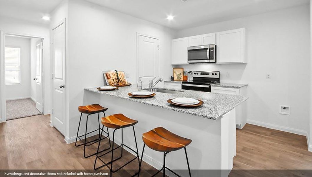 Furnished interior view inside a new home in William Trails, Willis (Image 6).