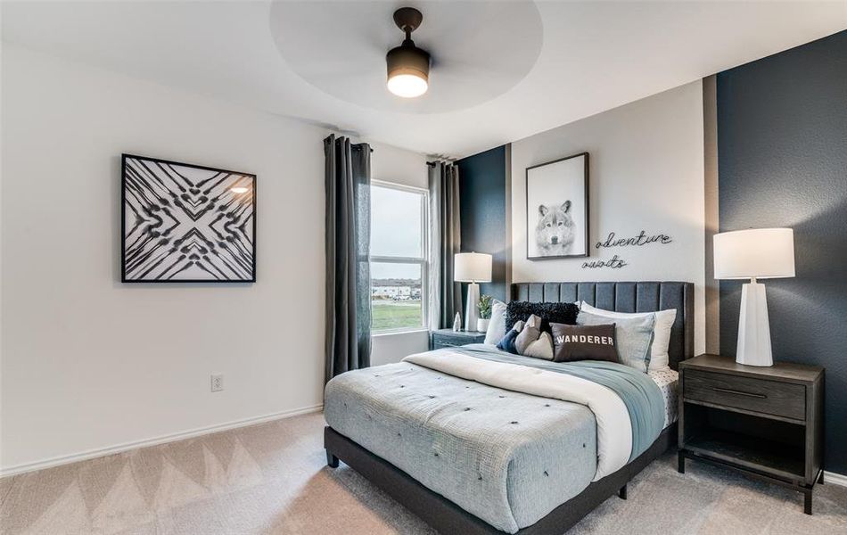 Spacious secondary bedroom with large windows