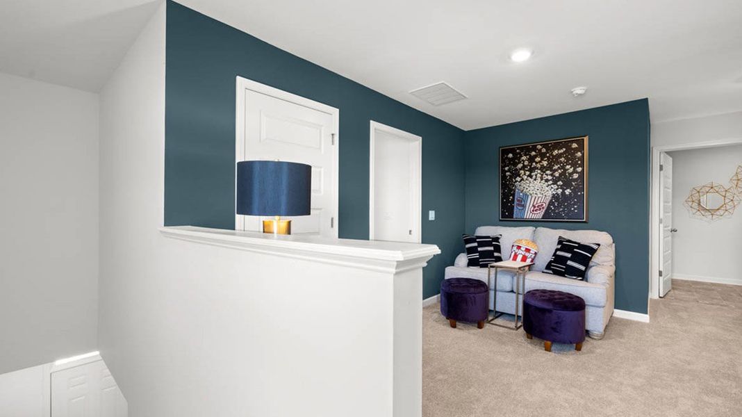 Representative furnished interior of a home built from the Robie by D.R. Horton in Kingston Ranch at Lake Oconee, Buckhead (Image 26).
